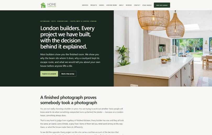 Home Constructive homepage for a London builder, with a dark slate hero and a finished kitchen extension photograph